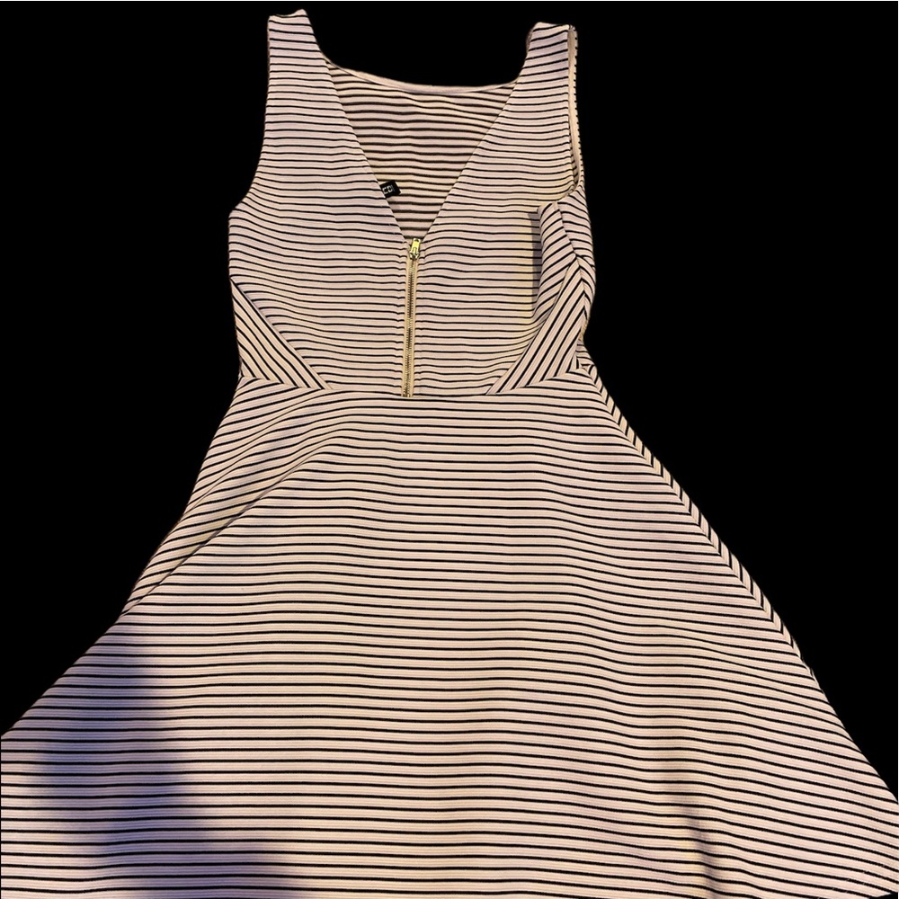 Knee length dress.